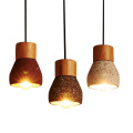 Creatividad nórdica pequeña lámpara colgante de hormigón para decoración del hogar.